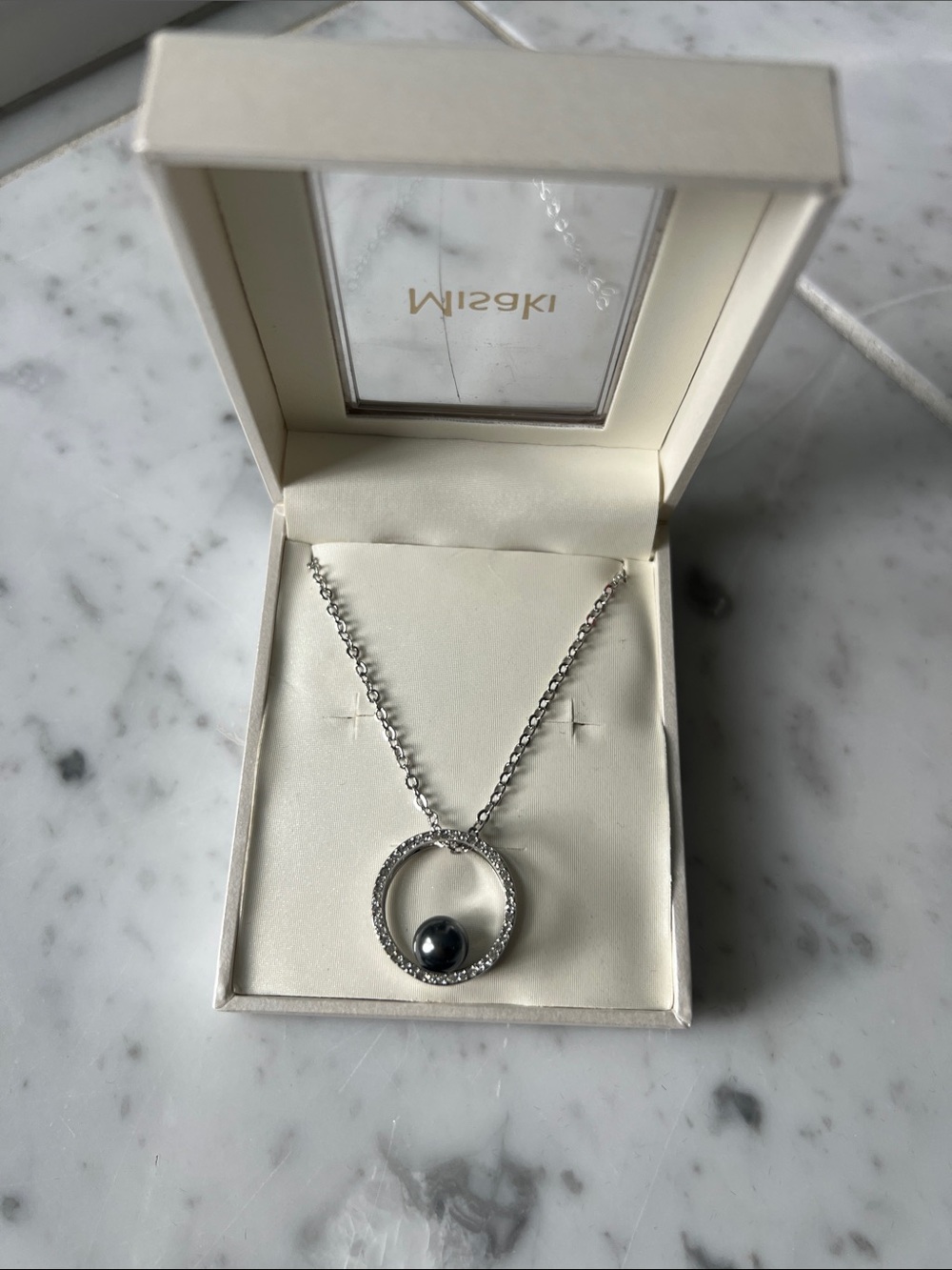 Silver Circle Necklace with Black Pearl Accent